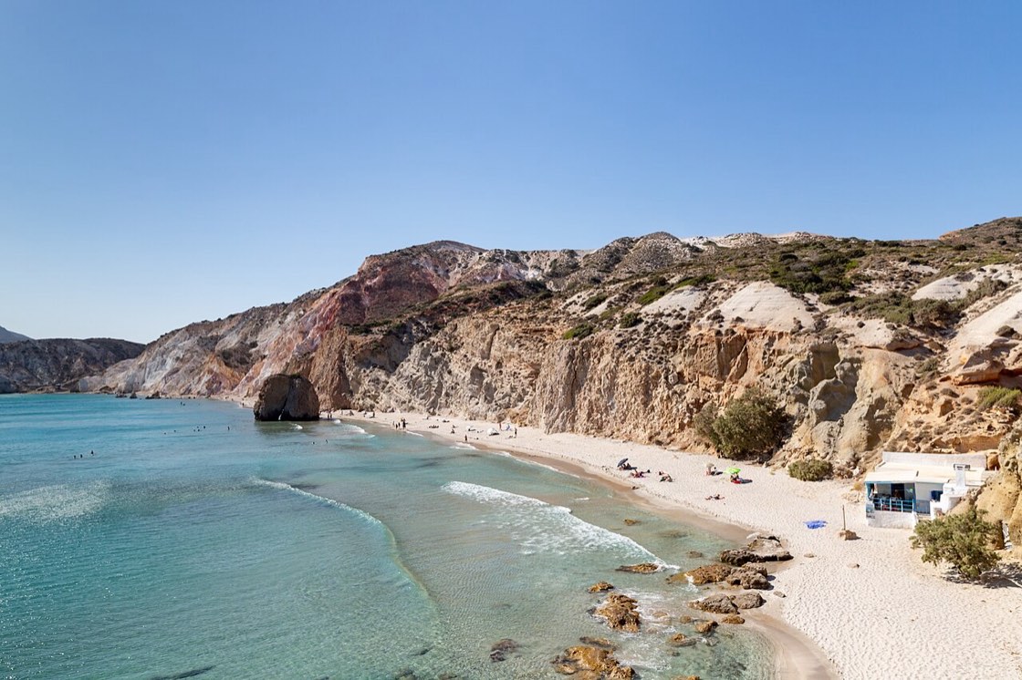 Colourful cliffs and turquoise water at Firiplaka, Milos